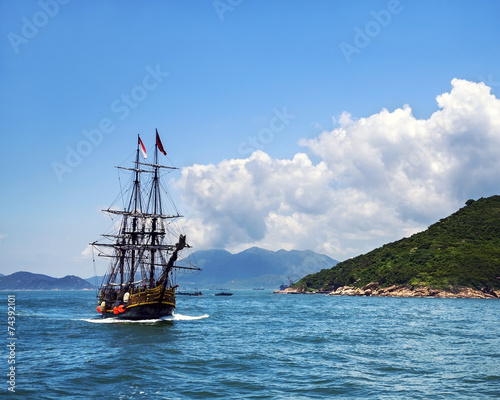 Historic old ship in the ocean photo
