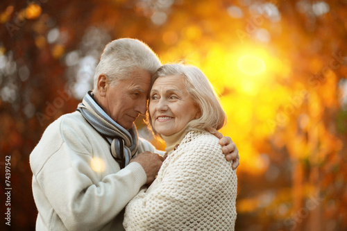 Senior couple in autumn park
