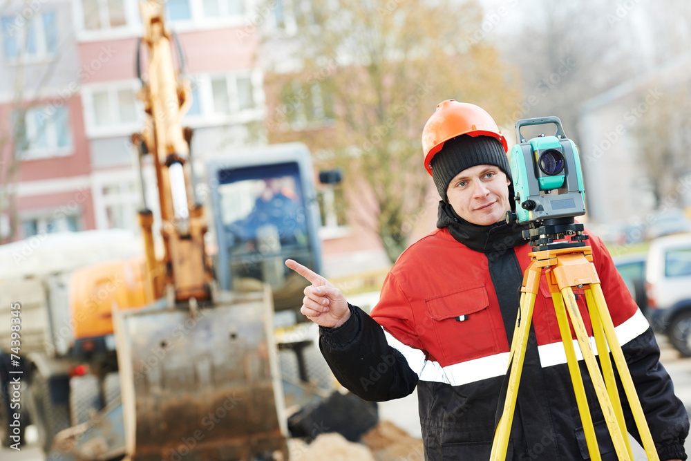 surveyor works with theodolite