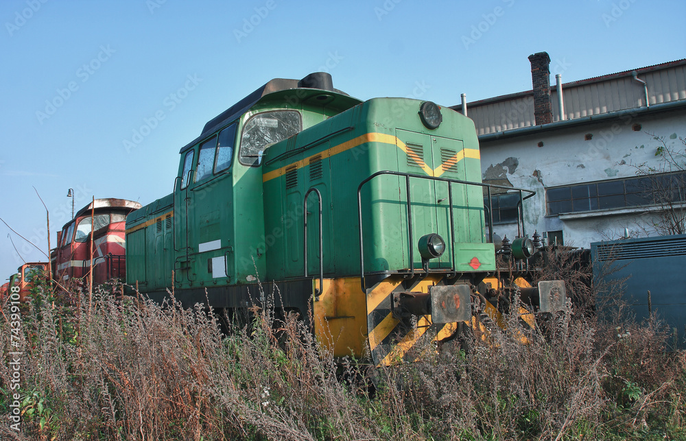 Old abandoned trains at depot in sunny day Old abandoned trains at depot in sunny day