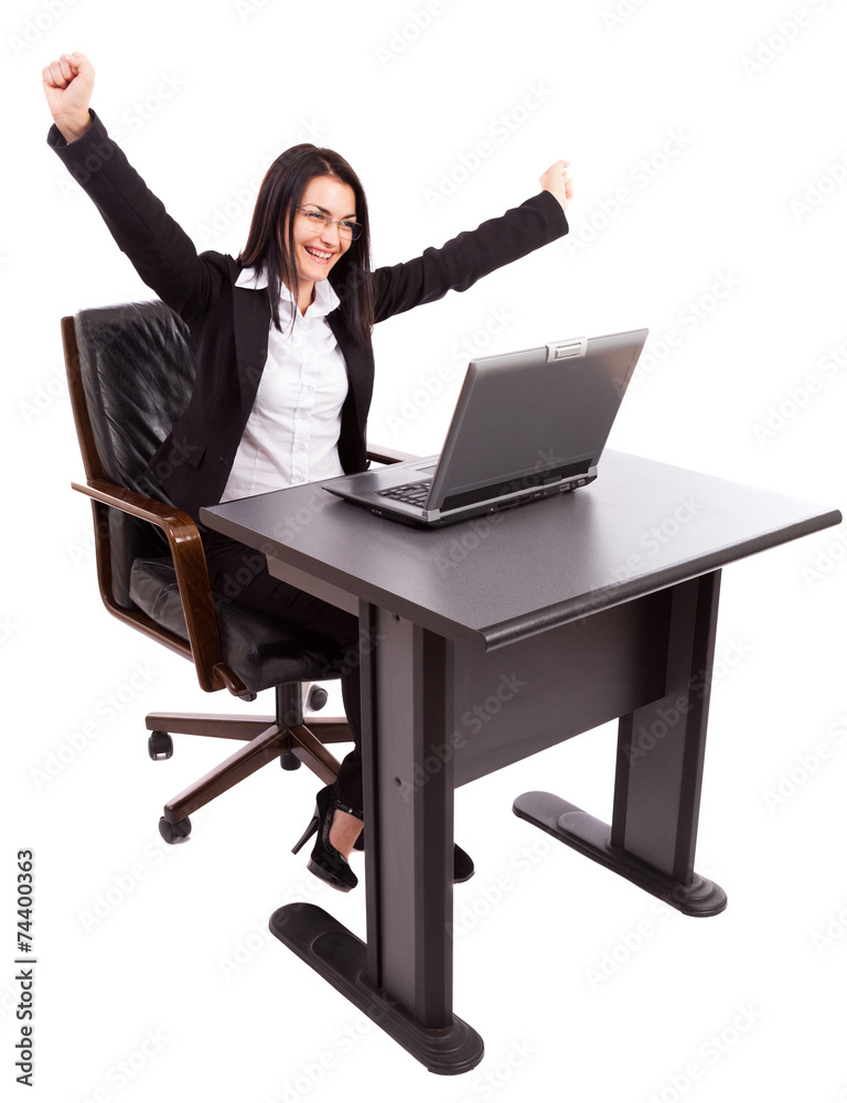 Happy businesswoman at her desk Happy businesswoman at her desk