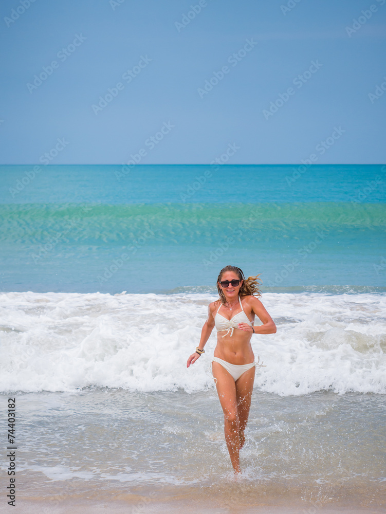 Fototapeta premium Woman in Bikini on the beach