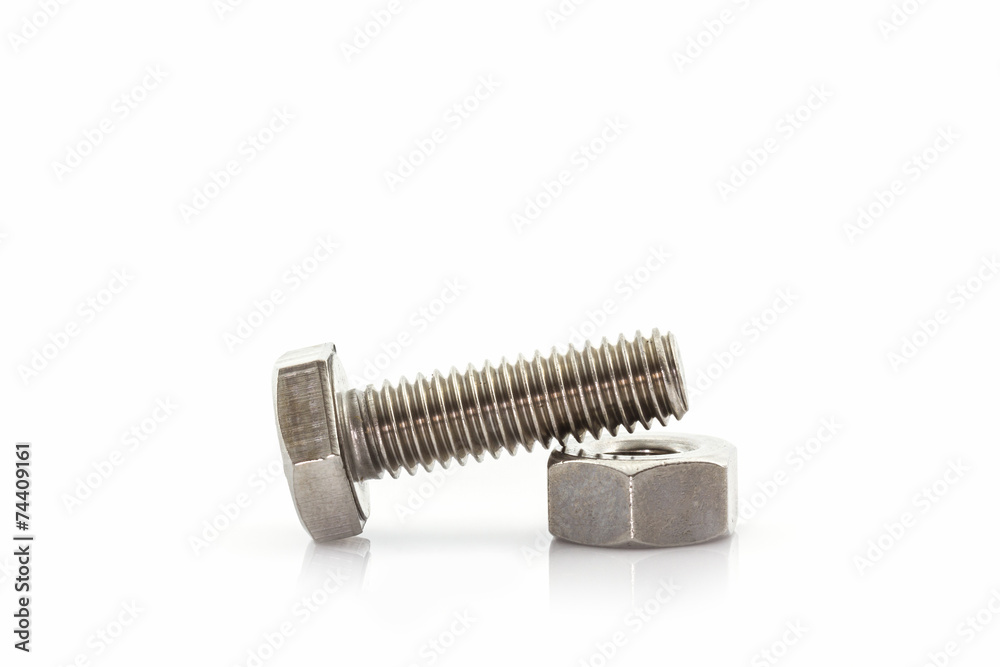 Metal screw and nuts on white background. Metal screw and nuts on white background.