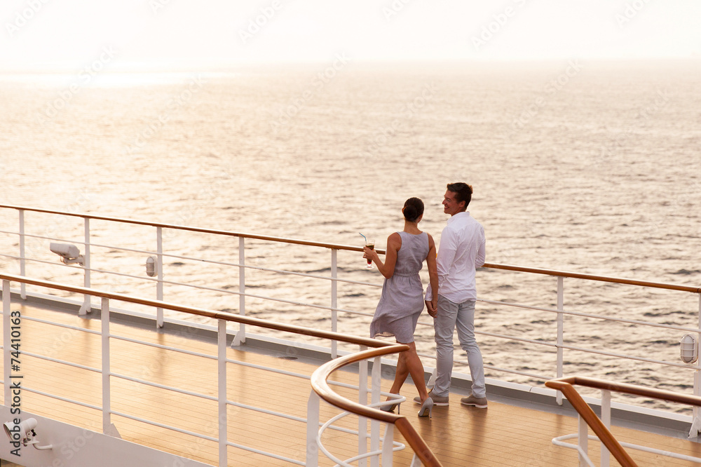 couple walking on cruise ship deck