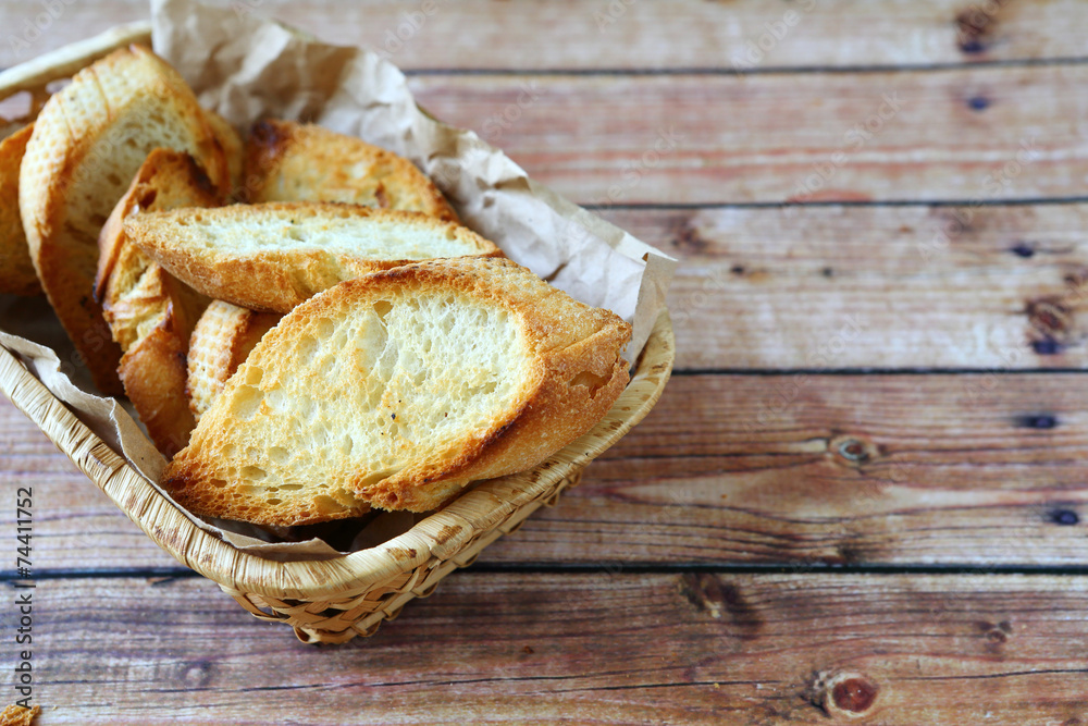 roasted baguette slices in a basket roasted baguette slices in a basket