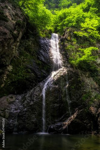 Waterfall over a mossy creek taken in Wanju  South Korea