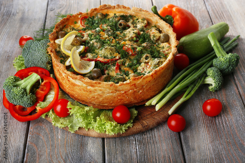 Vegetable pie with broccoli, peas, tomatoes and cheese