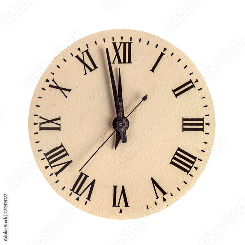 Vintage clock face showing two minutes to twelve
