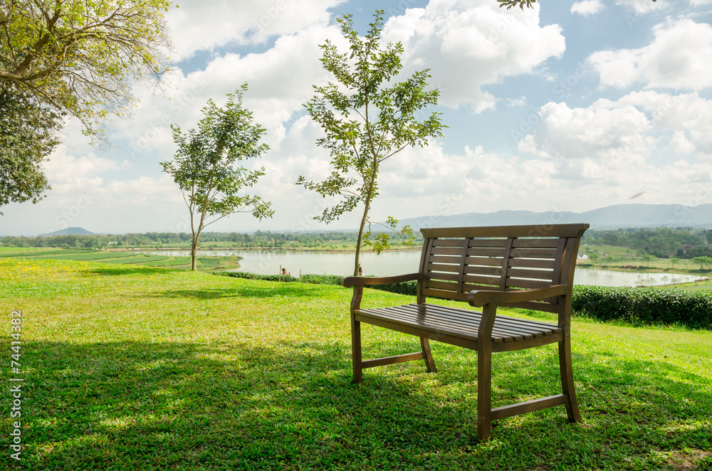 Bench in beautiful garden in Singha park Chiang Rai,Thailand Bench in beautiful garden in Singha park Chiang Rai,Thailand