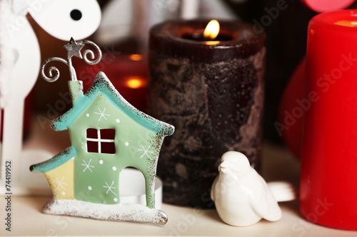 Fireplace with beautiful Christmas decorations in room