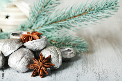 Beautiful Christmas composition with silver walnuts,