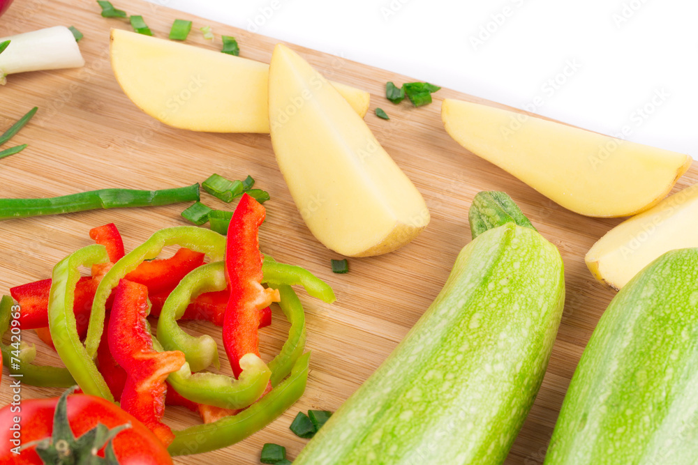 vegetables on wooden platter vegetables on wooden platter