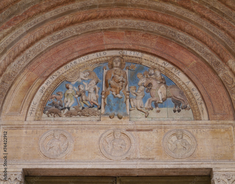 The colourful madonno relief of the cathedral in Verona in Italy The colourful madonno relief of the cathedral in Verona in Italy