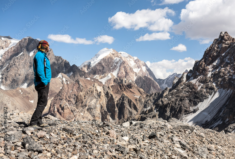 Hiker in high mountains.