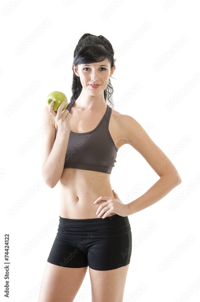 Young attractive exercise girl with green apple Young attractive exercise girl with green apple