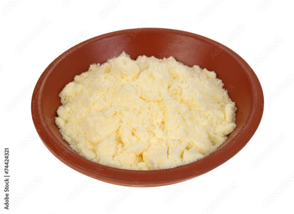 Dried imitation butter seasoning in a small bowl Dried imitation butter seasoning in a small bowl