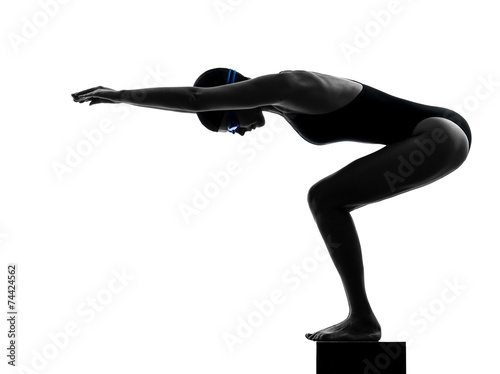 woman competition swimmer on starting silhouette