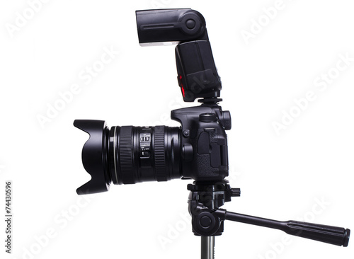  DSLR camera on tripod with external flash
