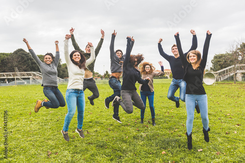 Multiethnic Group of Friends Jumping Together