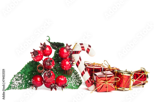 european holly with candy cane and gift box