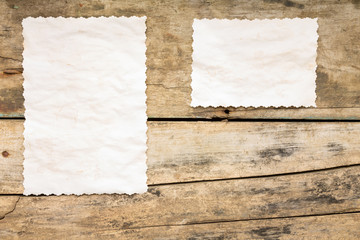 Recipe background. Blank paper sheet on wooden table.