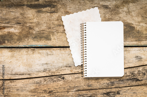 Recipe book on textured wood background photo