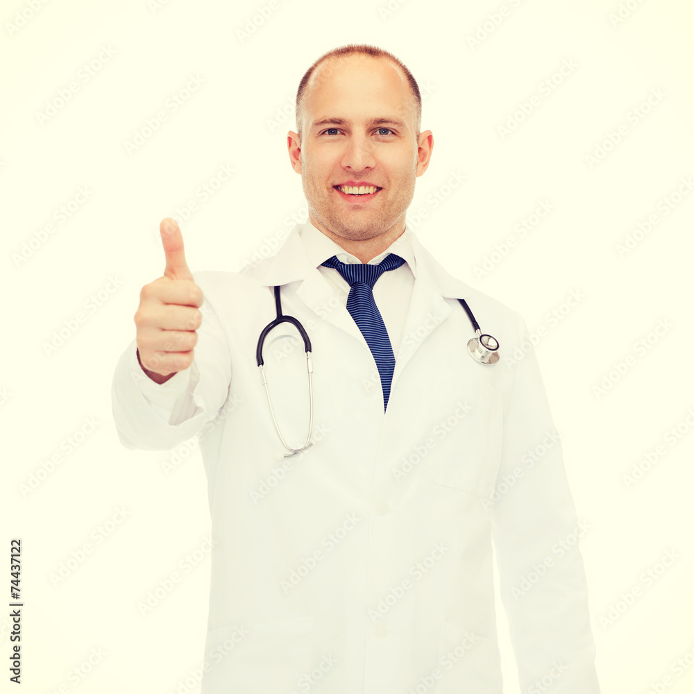 smiling doctor with stethoscope showing thumbs up smiling doctor with stethoscope showing thumbs up