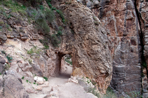 A tunnel through rock in the Grand Canyon.