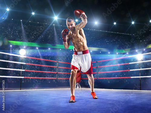 Professionl boxer is standing on the ring © 103tnn