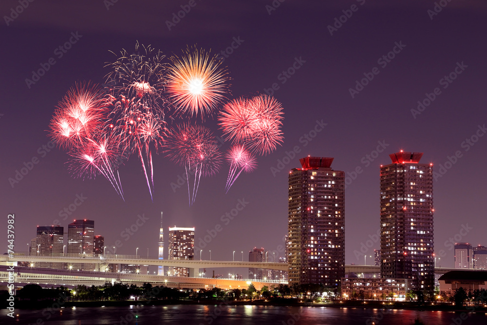 Fireworks celebrating over Odaiba, Tokyo cityscape at night Fireworks celebrating over Odaiba, Tokyo cityscape at night