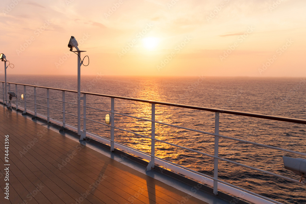 deck of a cruise ship at sunrise deck of a cruise ship at sunrise