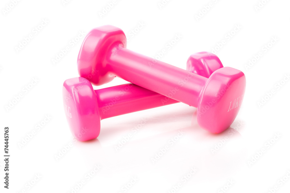 Two pink glossy dumbbell isolated on white Two pink glossy dumbbell isolated on white