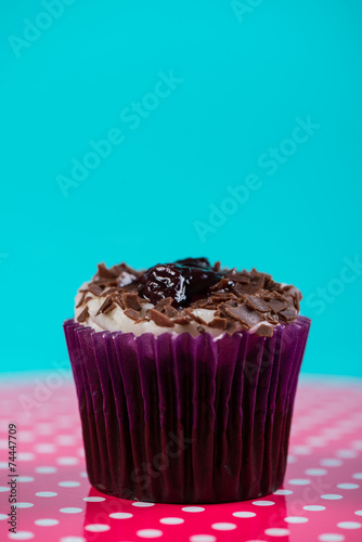 Cup cake on bright background