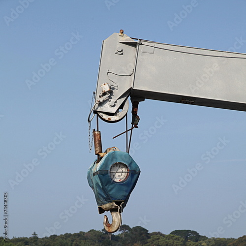 Grue et peson. photo