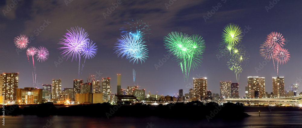 Obraz premium Fireworks celebrating over Odaiba, Tokyo cityscape at night