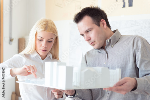 Architect Working on a model building