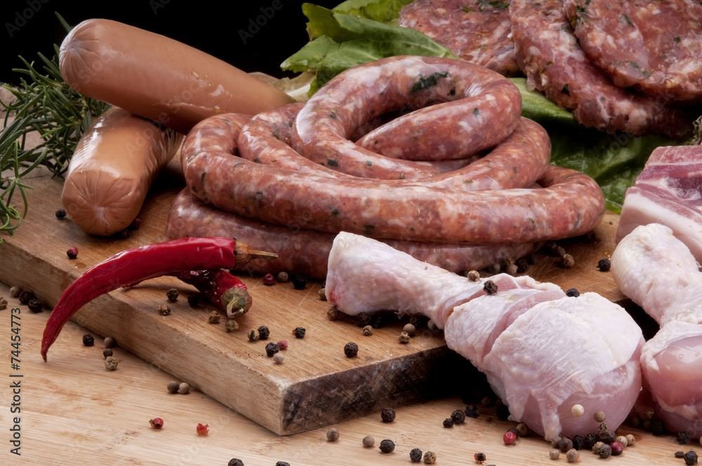 Raw meat on a chopping board Raw meat on a chopping board
