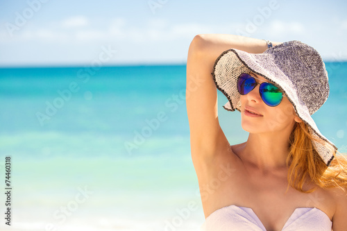happy young woman on beach female enjoying tropical weather