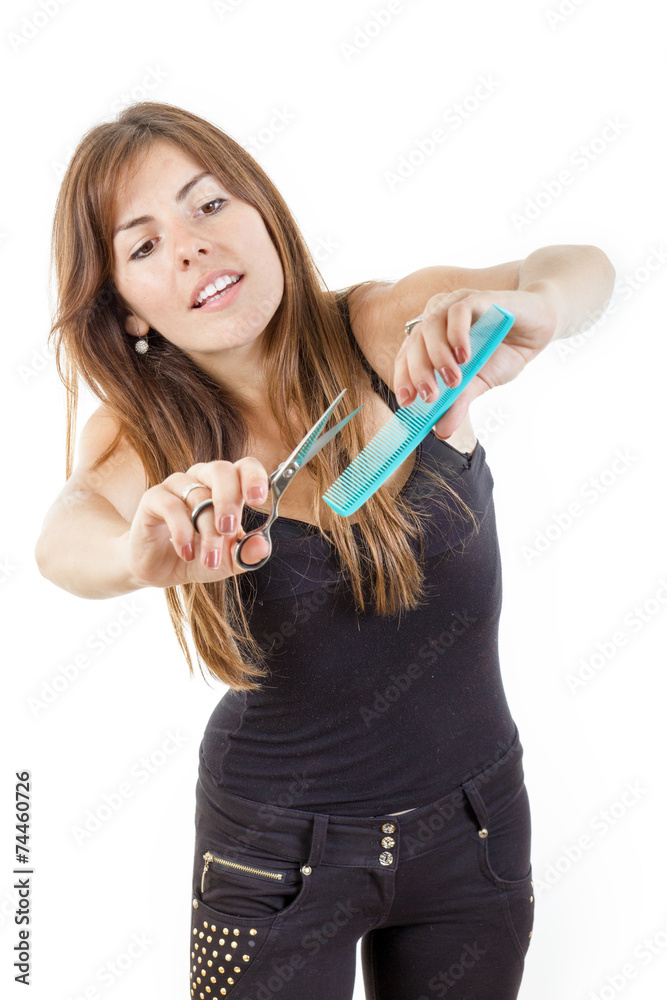 smiling female hairdresser using comb and scissors isolated smiling female hairdresser using comb and scissors isolated