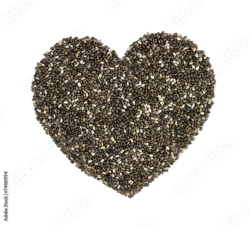 Chia seeds in heart shape isolated on white
