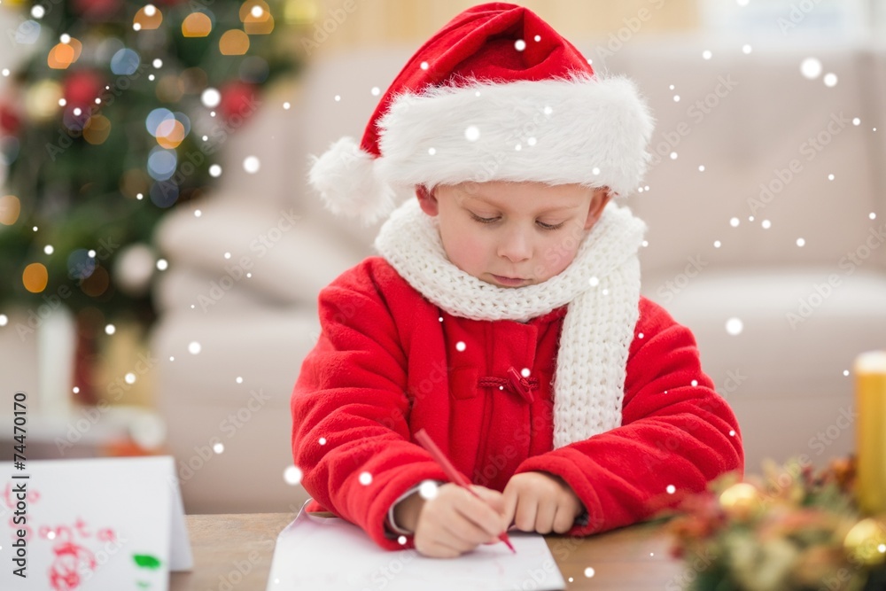 Composite image of festive little boy writing wish list