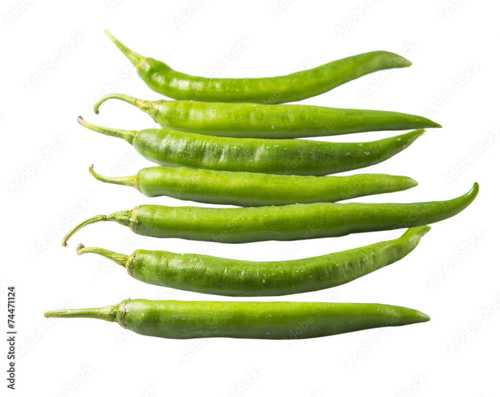 Green chili peppers over white background Green chili peppers over white background
