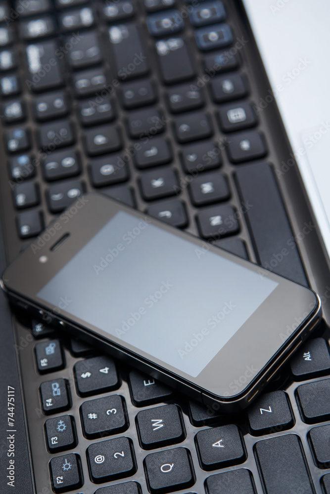 Smartphone and laptop keyboard