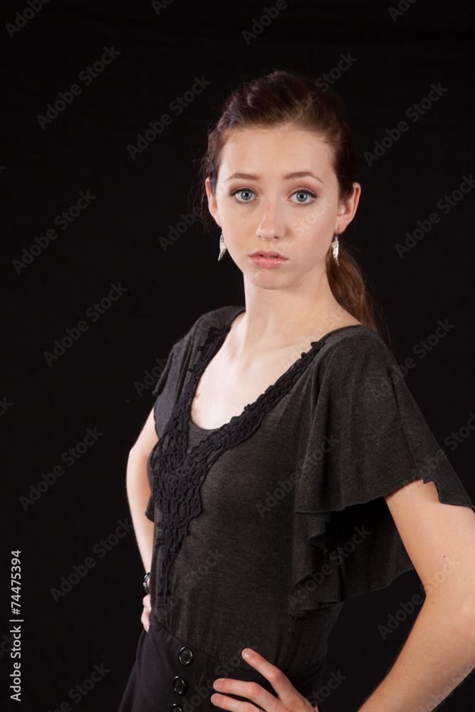 woman with long hair looking thoughtful woman with long hair looking thoughtful