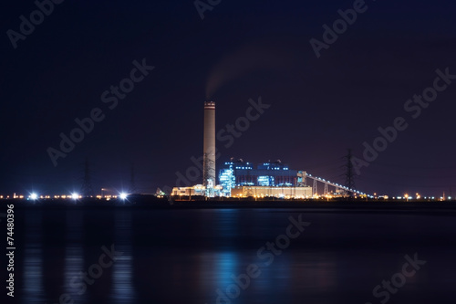 Power plant factory silhouette over sunset © chalermchai k