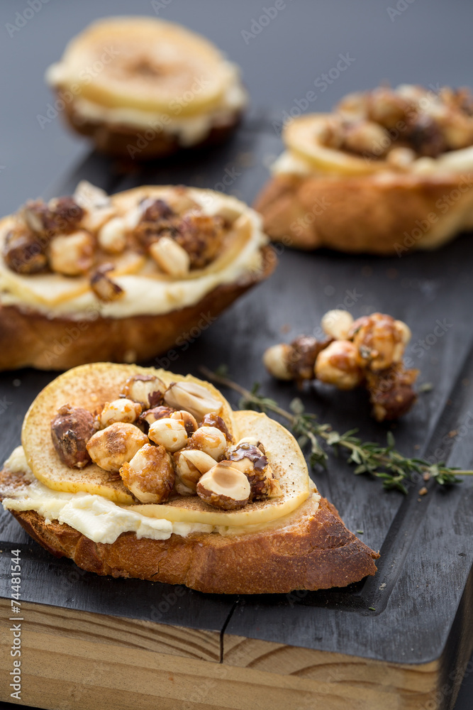 bruschetta with cheese, apple and walnuts