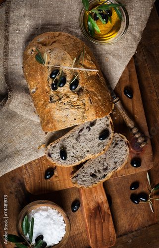 Sliced homemade olive bread, top view