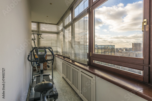 Interior balcony with gym simulators