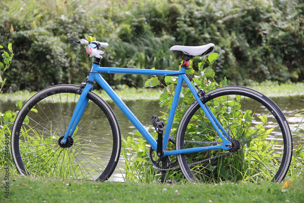 single speed blue bicycle