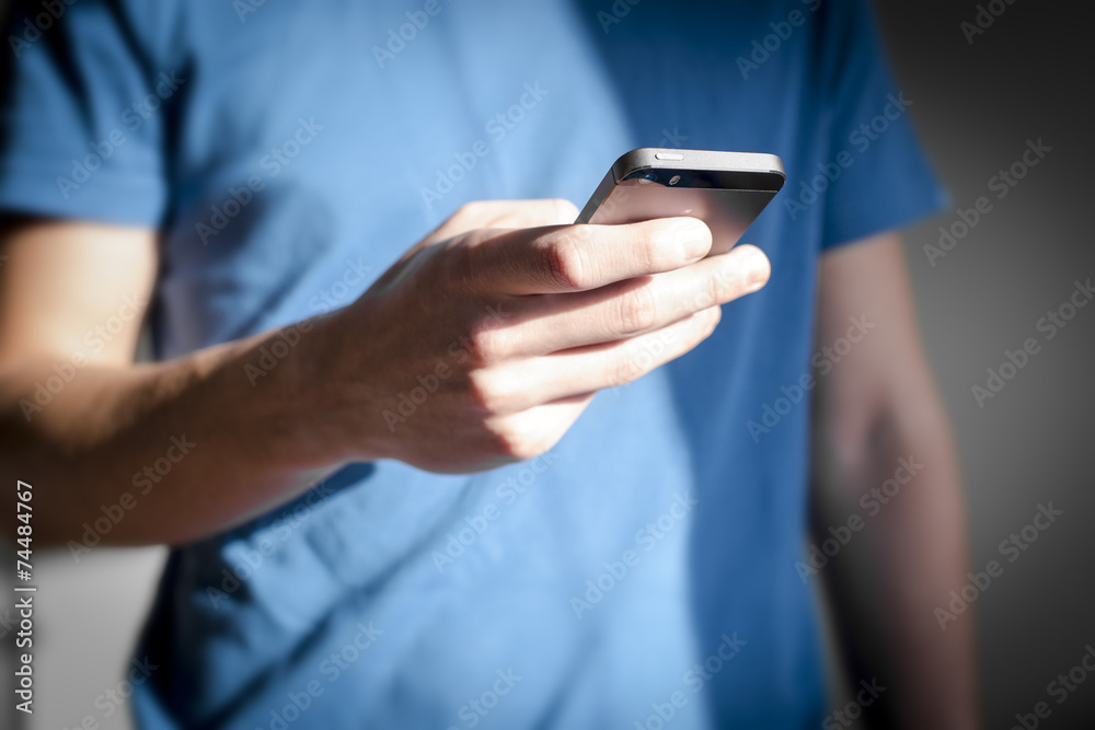 Man using smartphone. Man using smartphone.